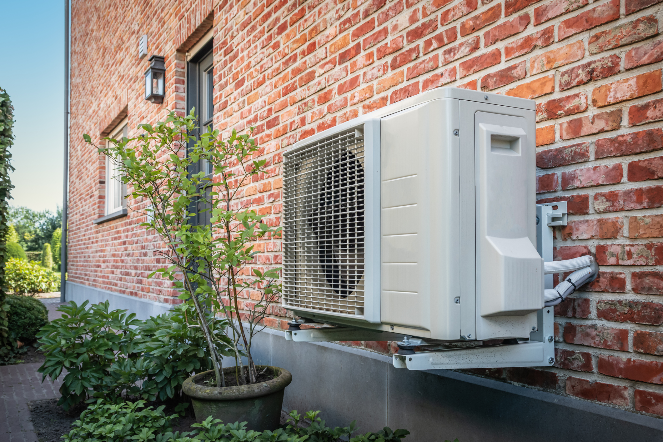 Heat Pump Outside Brick Home